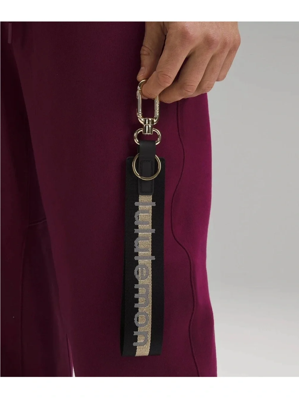 NWT Never Lost Keychain Black/ Gold Wordmark O/S